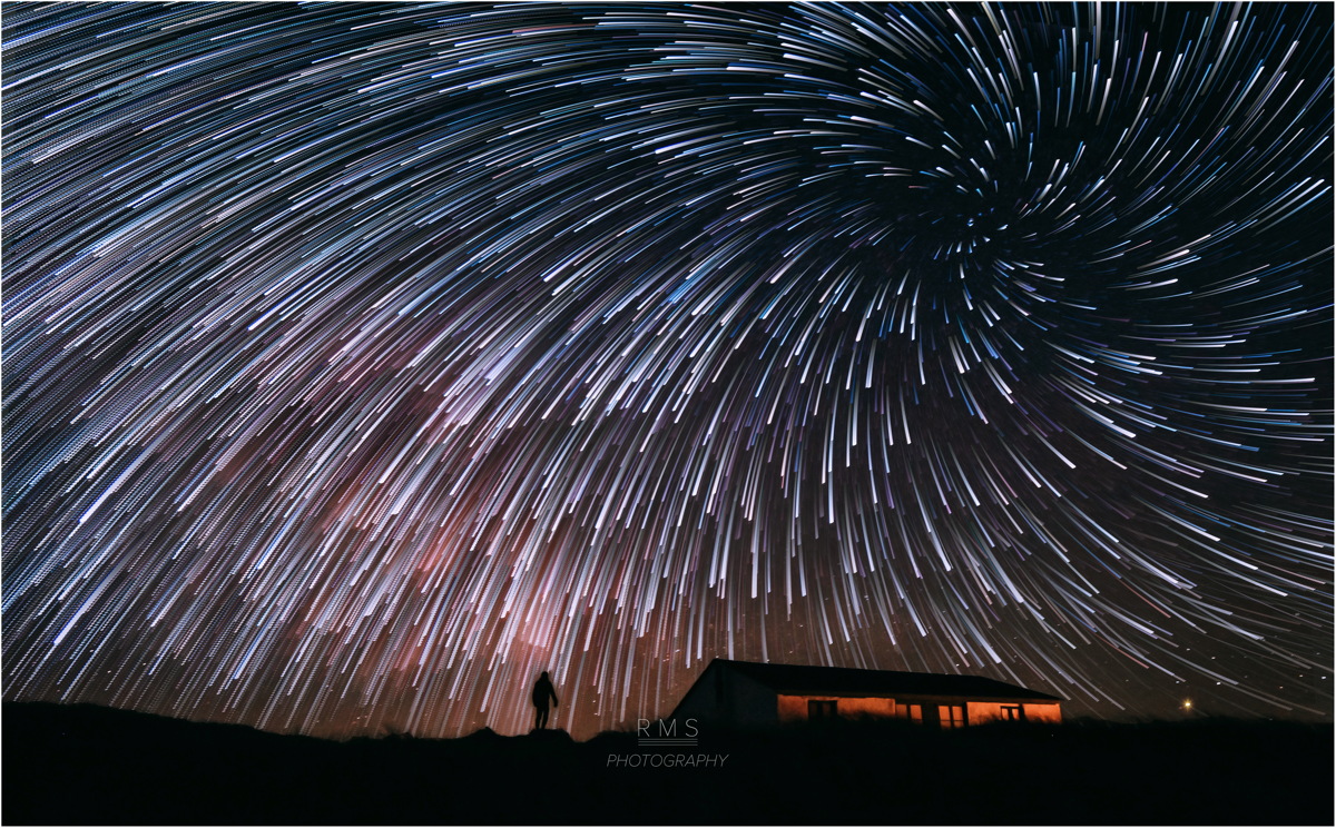 © Ruslan Merzlyakov - Vortex of star trails created using Photoshop - Stenbjerg, Thy National Park, Denmark. March 2015.